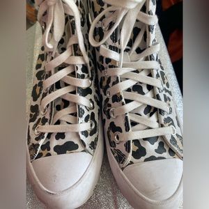 High top Converse leopard print platform sneakers